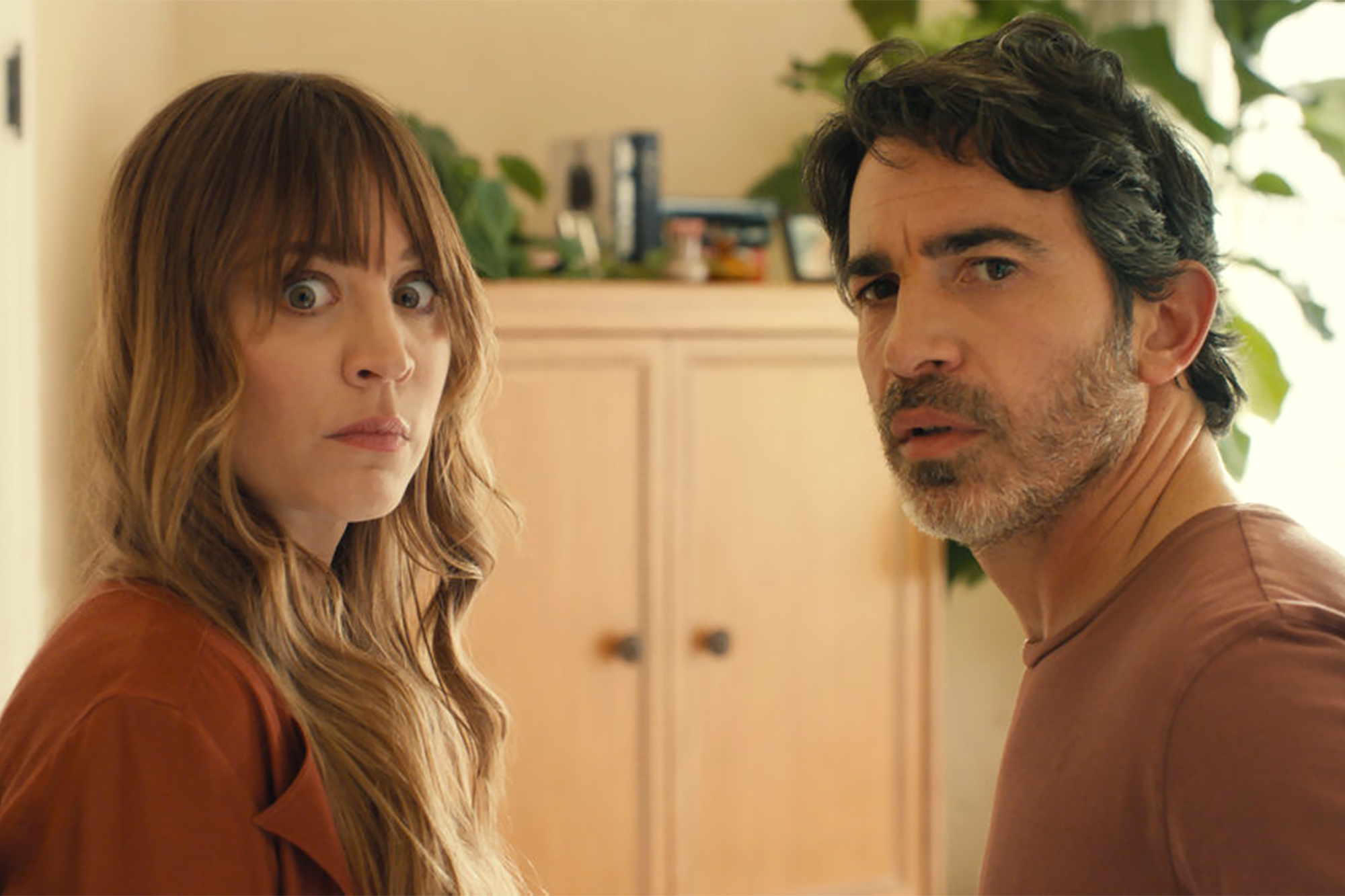 BASED ON A TRUE STORY -- "The Great American Art Form" Episode 101 -- Pictured: (l-r) Kaley Cuoco as Ava, Chris Messina as Nathan -- (Photo by: PEACOCK)