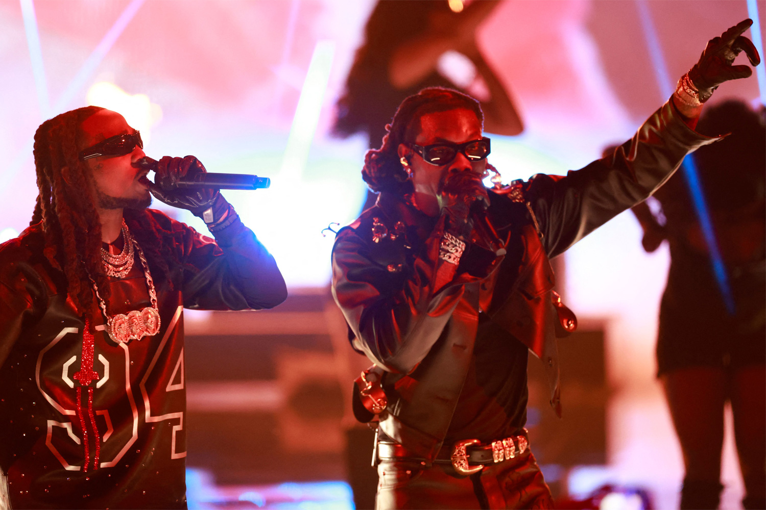 Offset and Quavo perform on stage during the 2023 BET awards