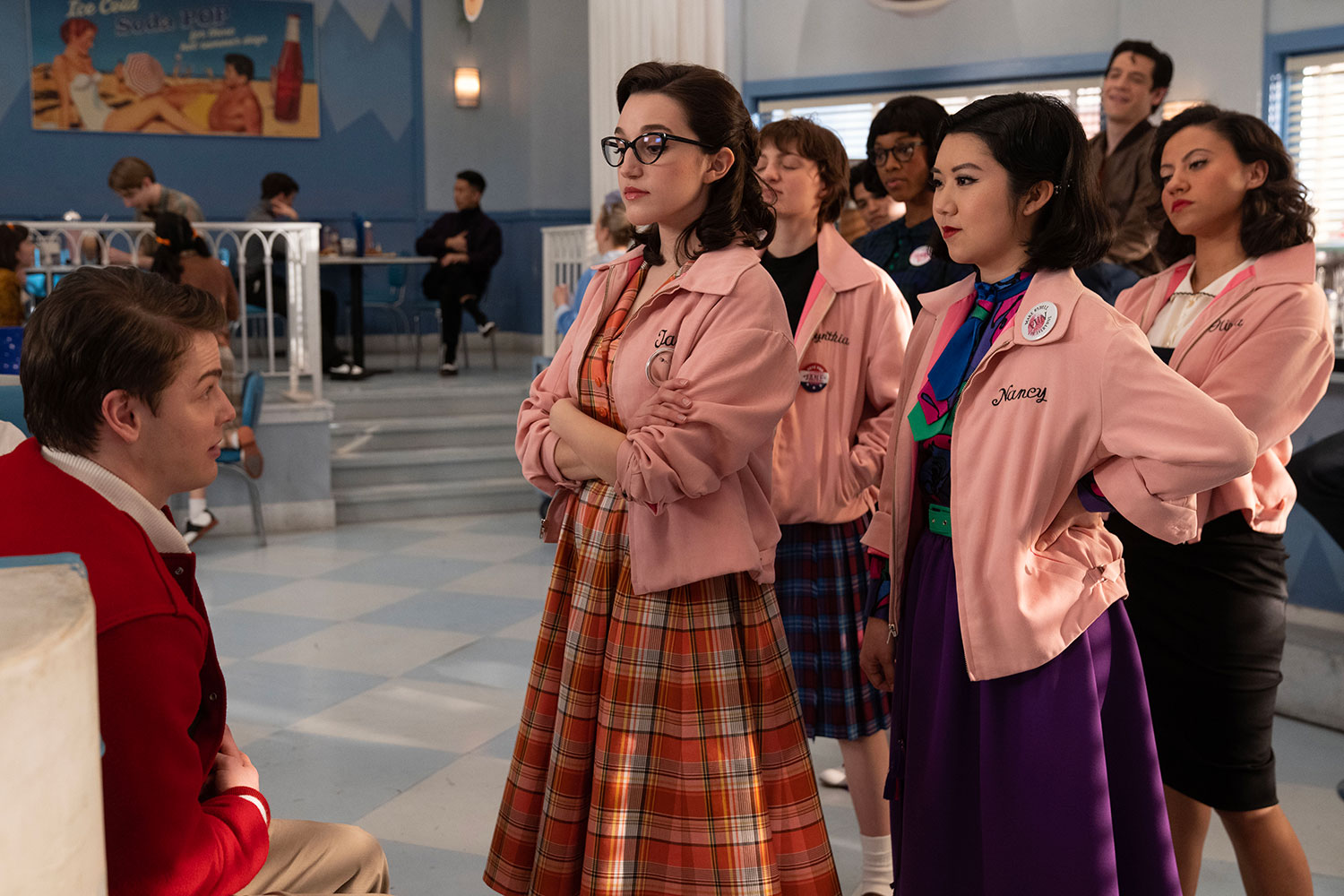 Jason Schmidt as Buddy, Marisa Davila as Jane Facciano, Ari Notartomaso as Cynthia Zdunowski, Shanel Bailey as Hazel, Tricia Fukuhara as Nancy Nakagawa, Alexis Sides as Potato and Cheyenne Wells as Olivia Valdovinos in Grease: Rise of the Pink Ladies: "So this is Rydell" EP #103 streaming on Paramount +, 2022. Photo Credit: Eduardo Araquel/Paramount+