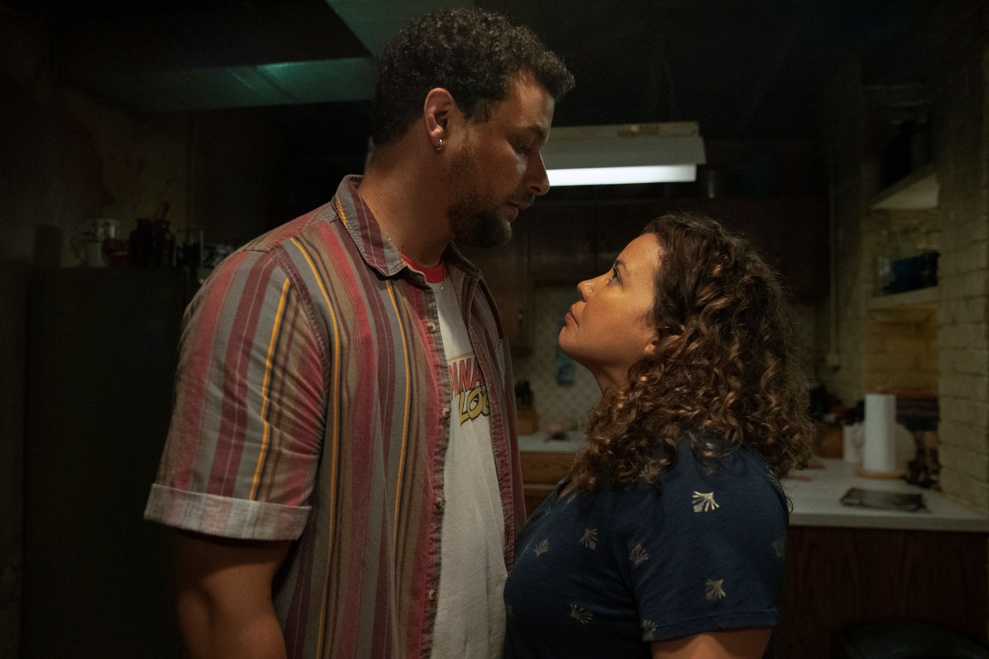 The Horror of Dolores Roach - First Look. Pictured (L-R): Alejandro Hernandez (Luis) and Justina Machado (Dolores Roach)